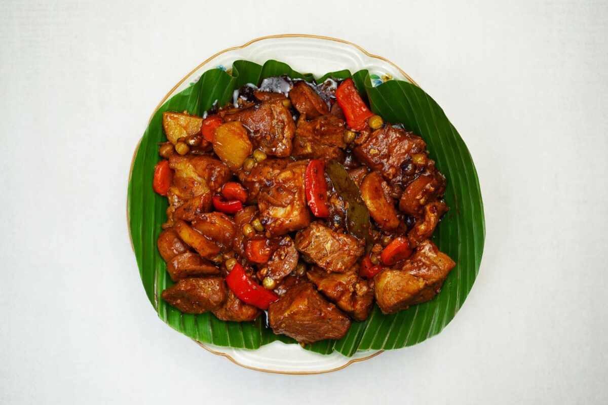 step 9 serve afritada hot with rice